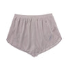 Back view of Y,IWO x Ace Hotel grey microfiber bodybuilding quad shorts featuring an elastic waistband, curved side hems, and a short 2.25-inch inseam.